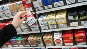 packs of cigarettes in convenience store rack