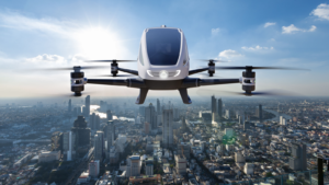 Autonomous driverless aerial vehicle flying on city background, Future transportation with 5G technology concept. EH stock