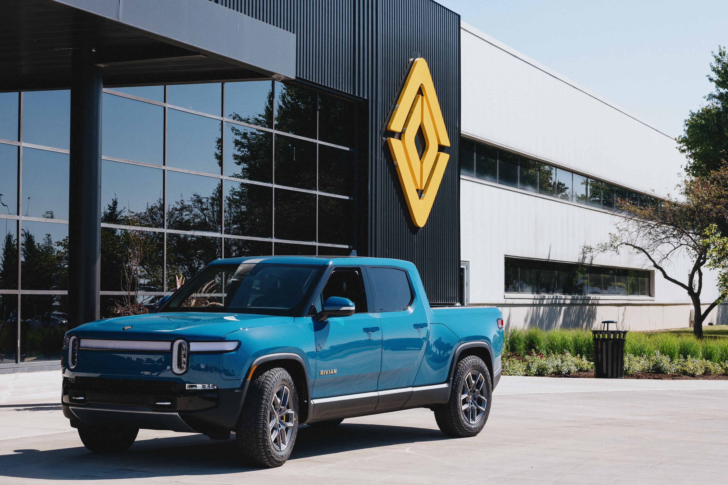 Rivian's R1T pickup in front of its plant in Normal, Illinois.