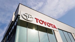 Toyota motor corporation logo on dealership building