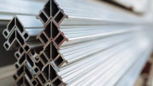 stack of aluminum framing construction material