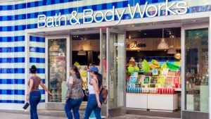 Several women walk past a Bath & Body Works (BBWI) retail store.