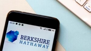 The logo for Berkshire Hathaway displayed on a smartphone screen.