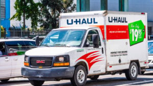 U-Haul van driving on a street in downtown San Francisco