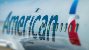 American Airlines plane on ramp in Chicago Airport. American Airlines is amongst the airlines cancelling flights