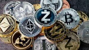 Cryptocurrency: Pile of cryptos and altcoins represented as physical coins. high-growth cryptos. altcoins to buy amid Bitcoin's bounce. Cryptos With Utility