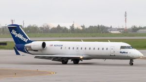 A close-up shot of a SkyWest (SKYW) plane.