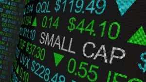 small-cap stocks: a ticker board that says "SMALL CAP" among various ticker increases. represents small-cap stocks to buy. Small-Cap Stock Picks