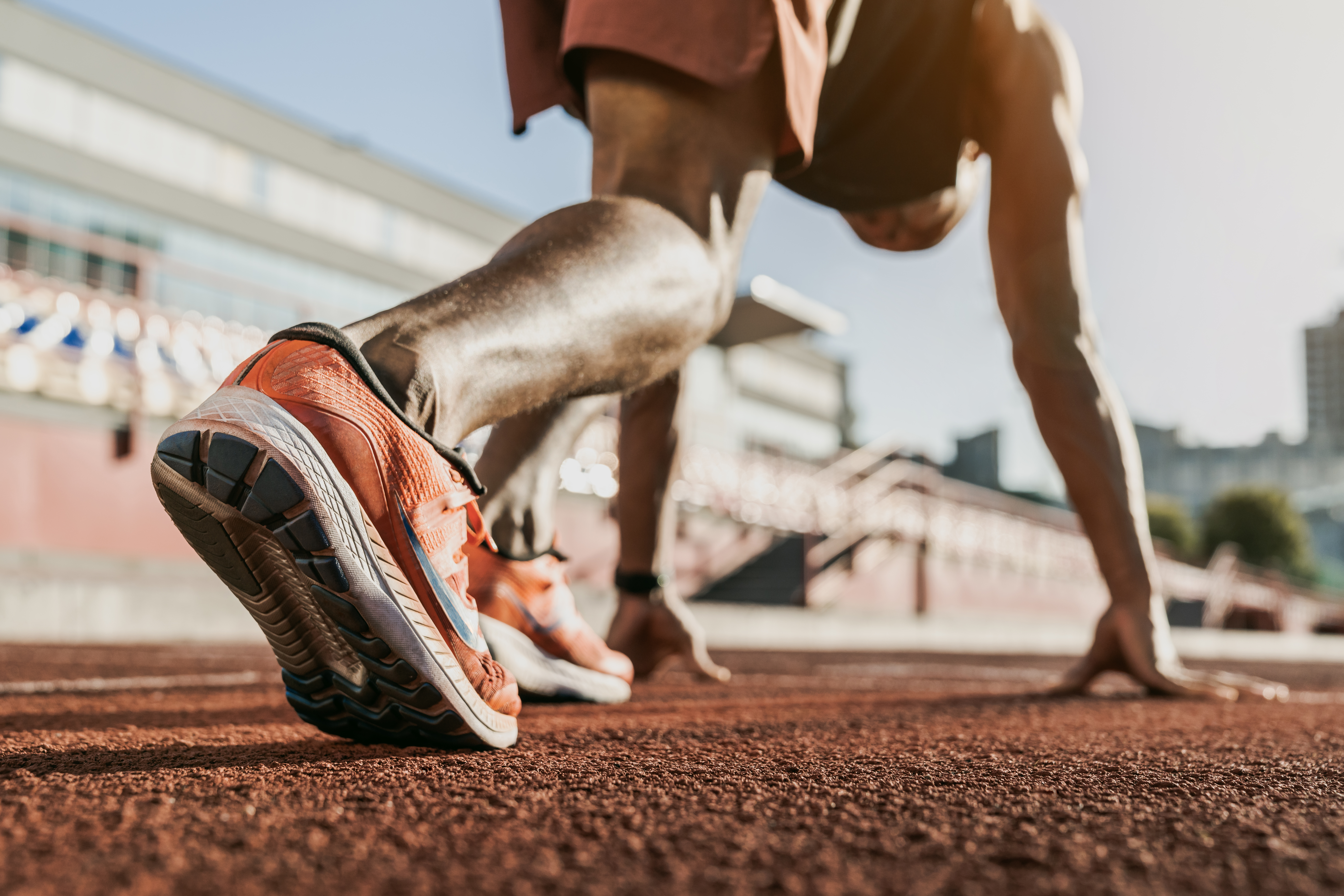 Shoes of a runner about to sprint. 