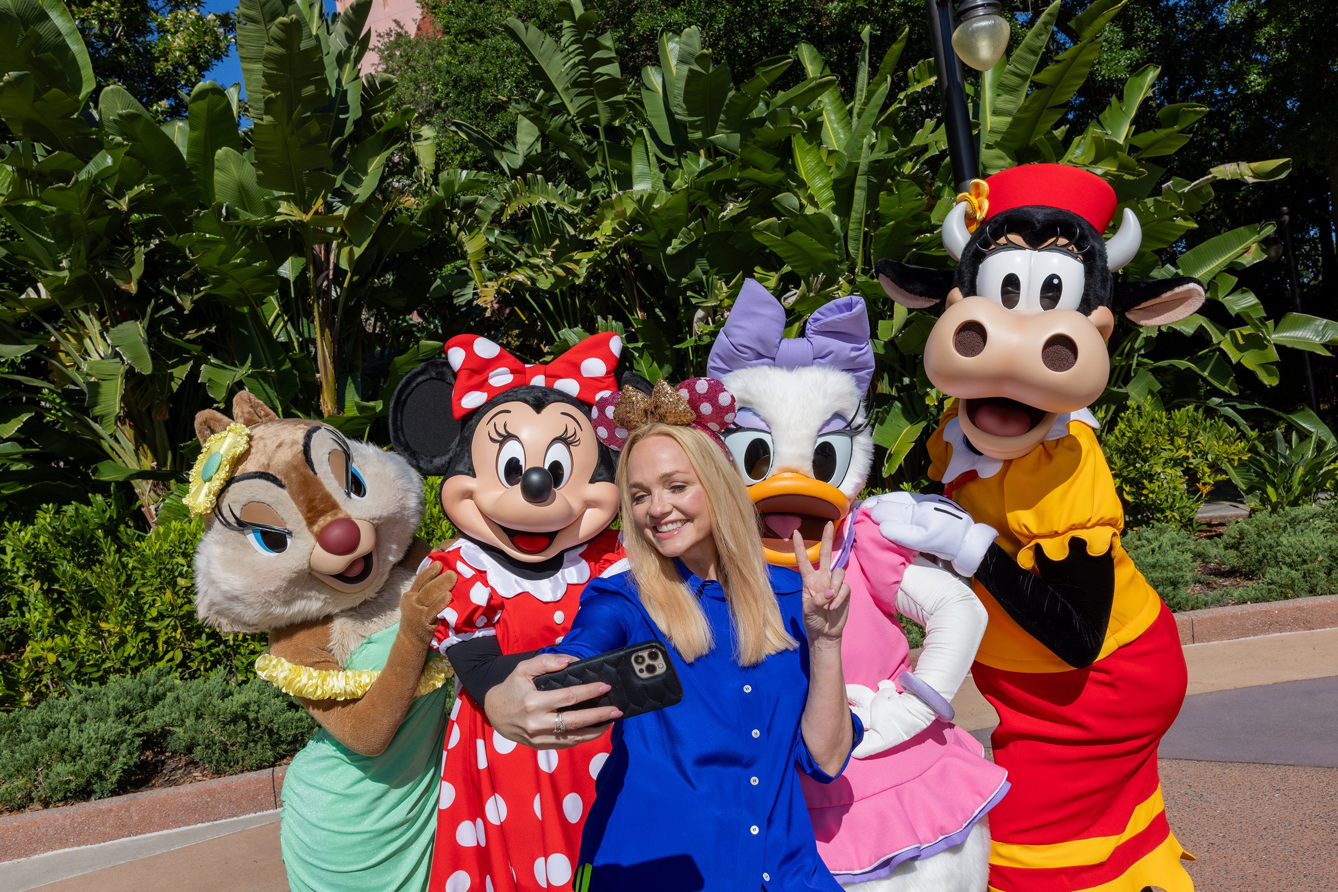 Spice Girl Emma Bunton takes a selfie with some of Disney World's own spice girls.