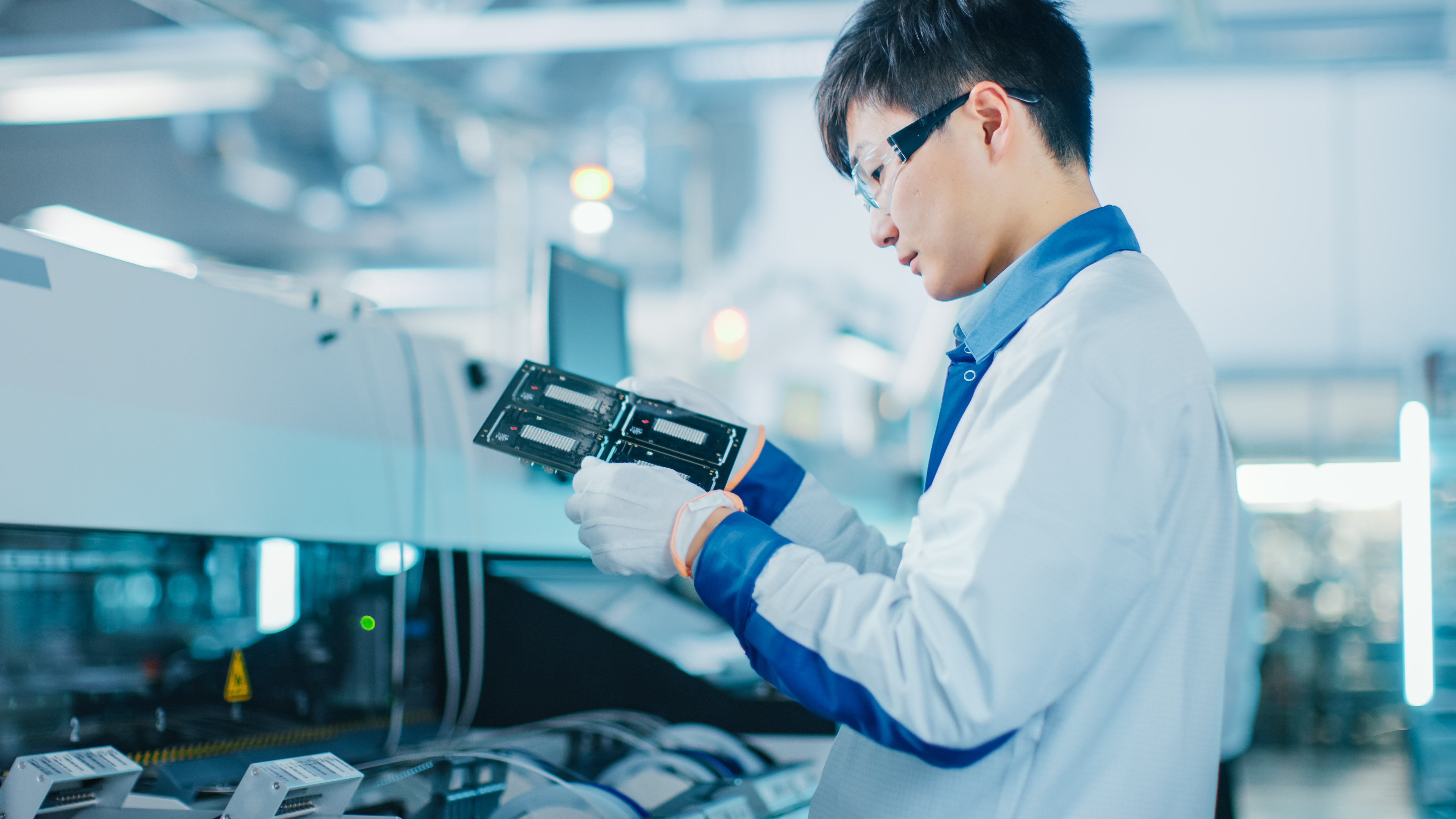 A person working inside of a chip factory.