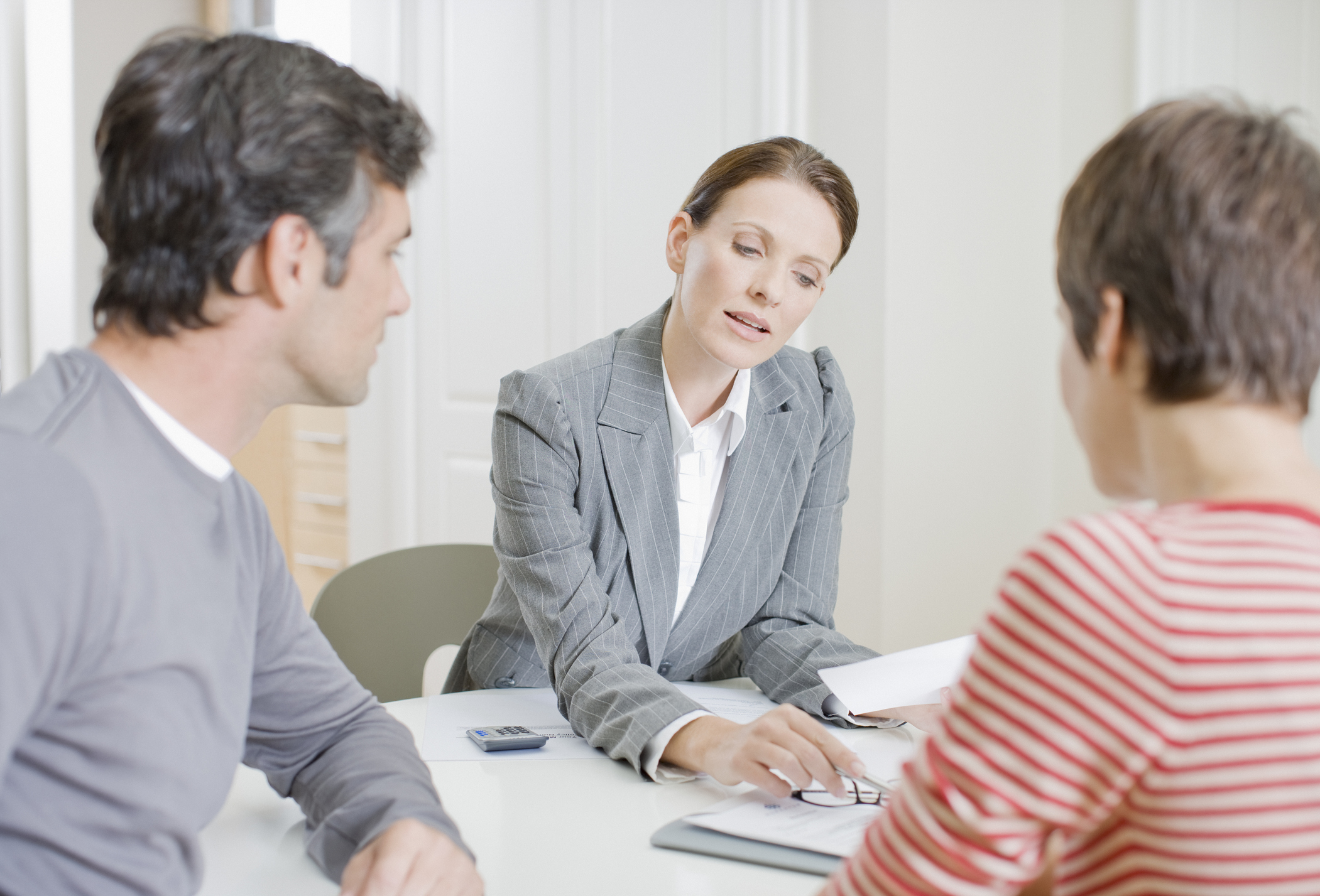 A consultant explaining business scenarios to clients.