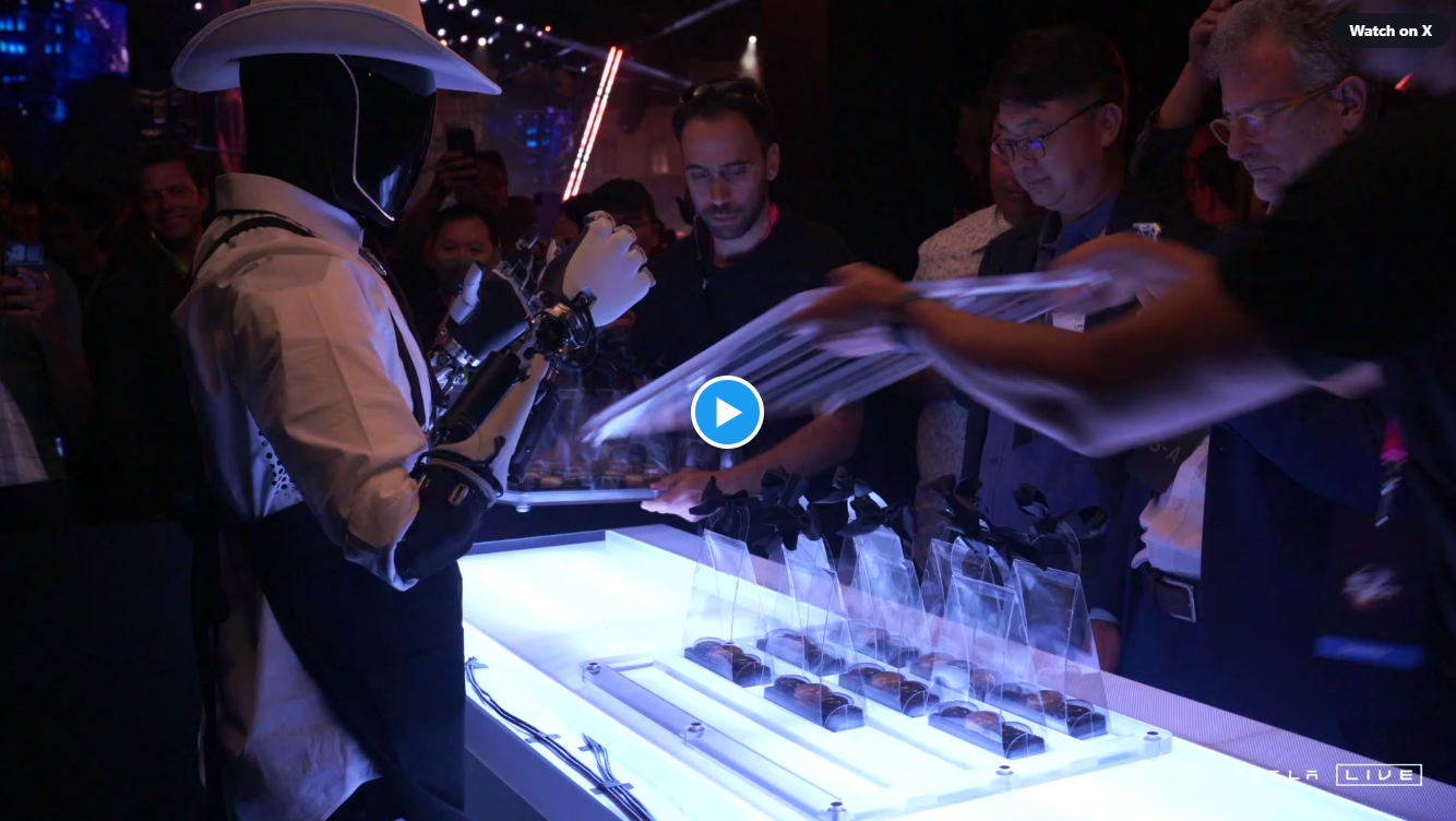 The Tesla Bot tending bar at a conference.