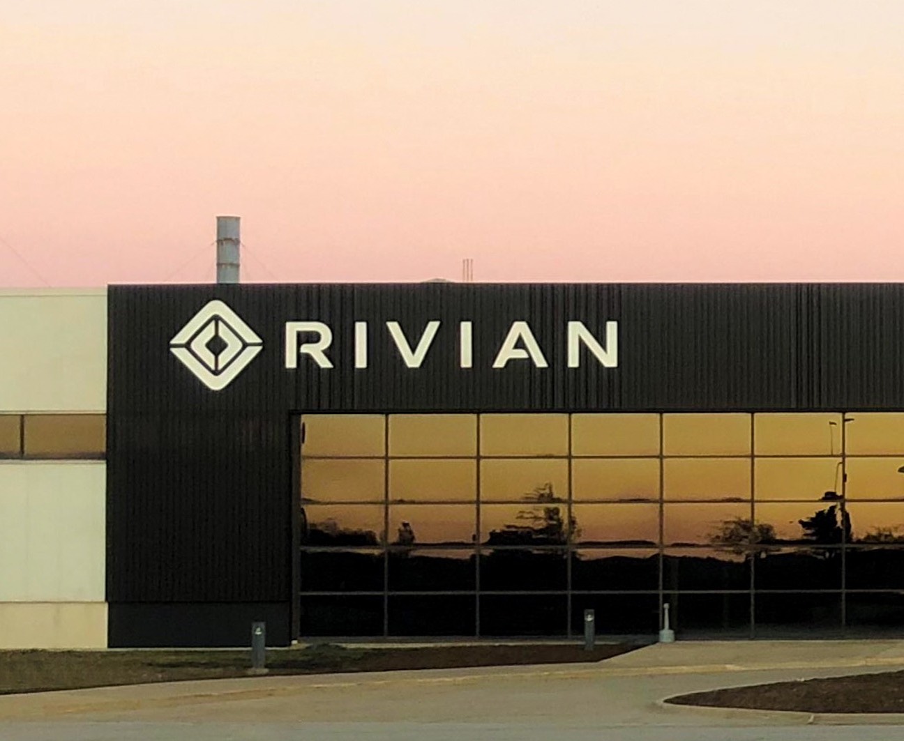 The Rivian sign on the outside of the company's manufacturing plant in Normal, Illinois.