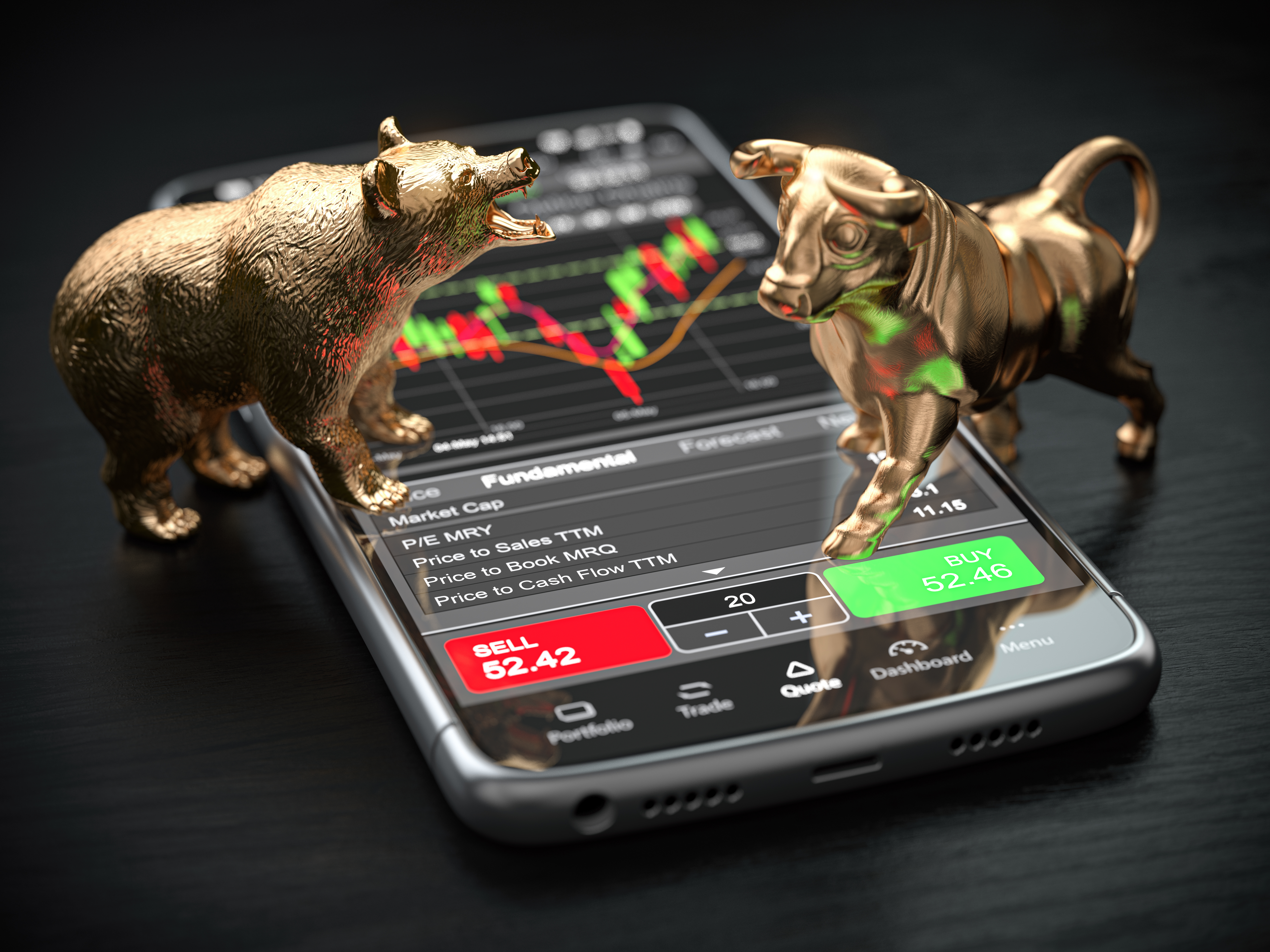 Bull and bear statues on a phone that shows a stock chart. 