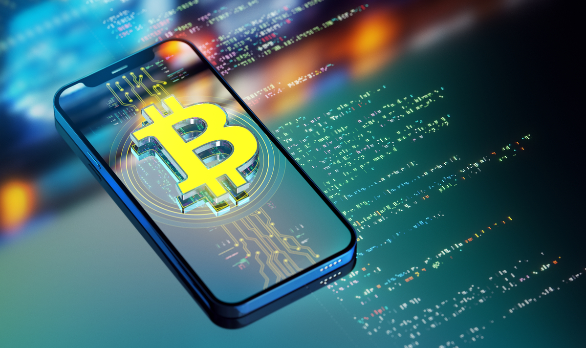 The Bitcoin logo on a smartphone.