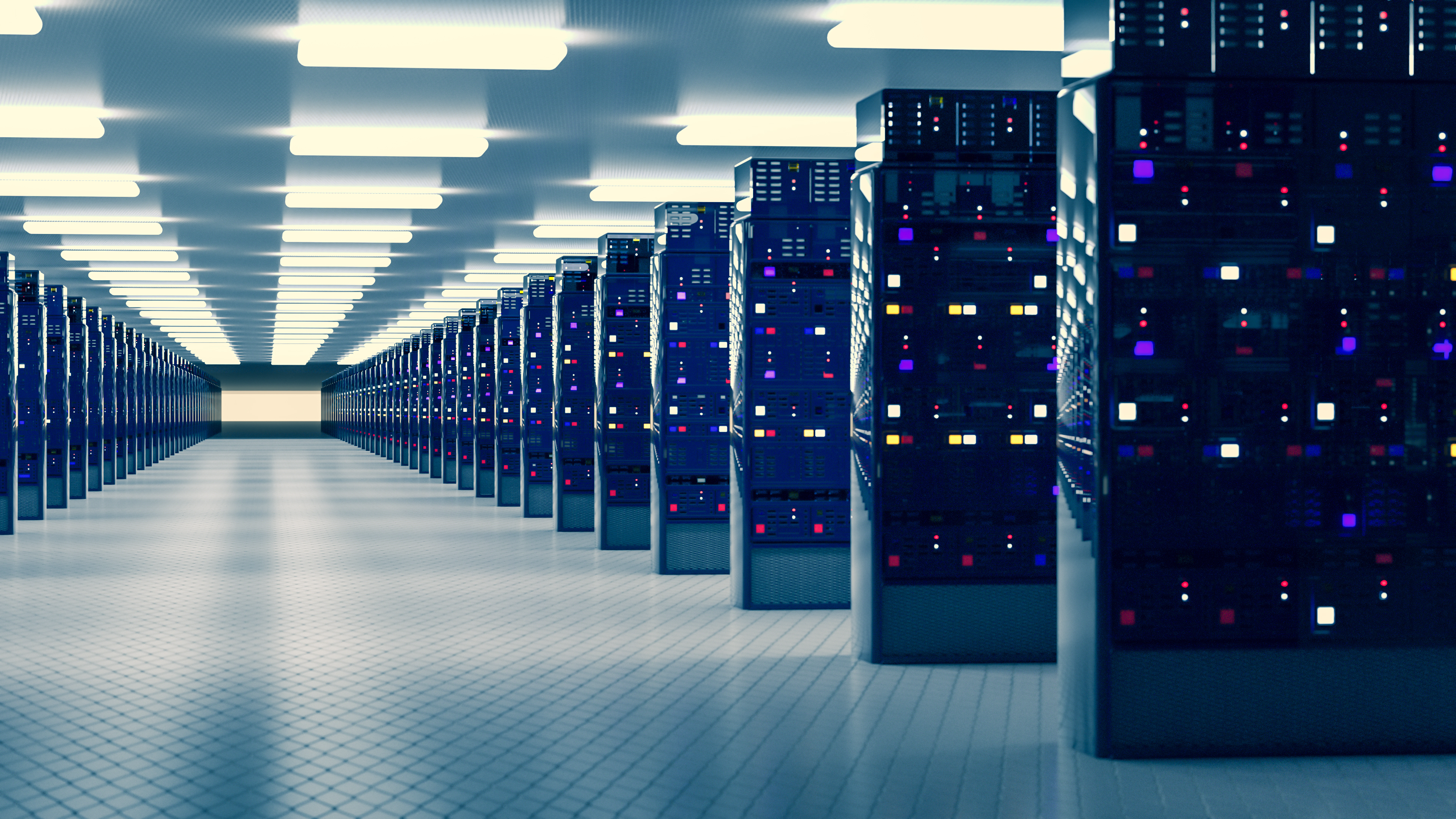 Rows of server racks in data center.