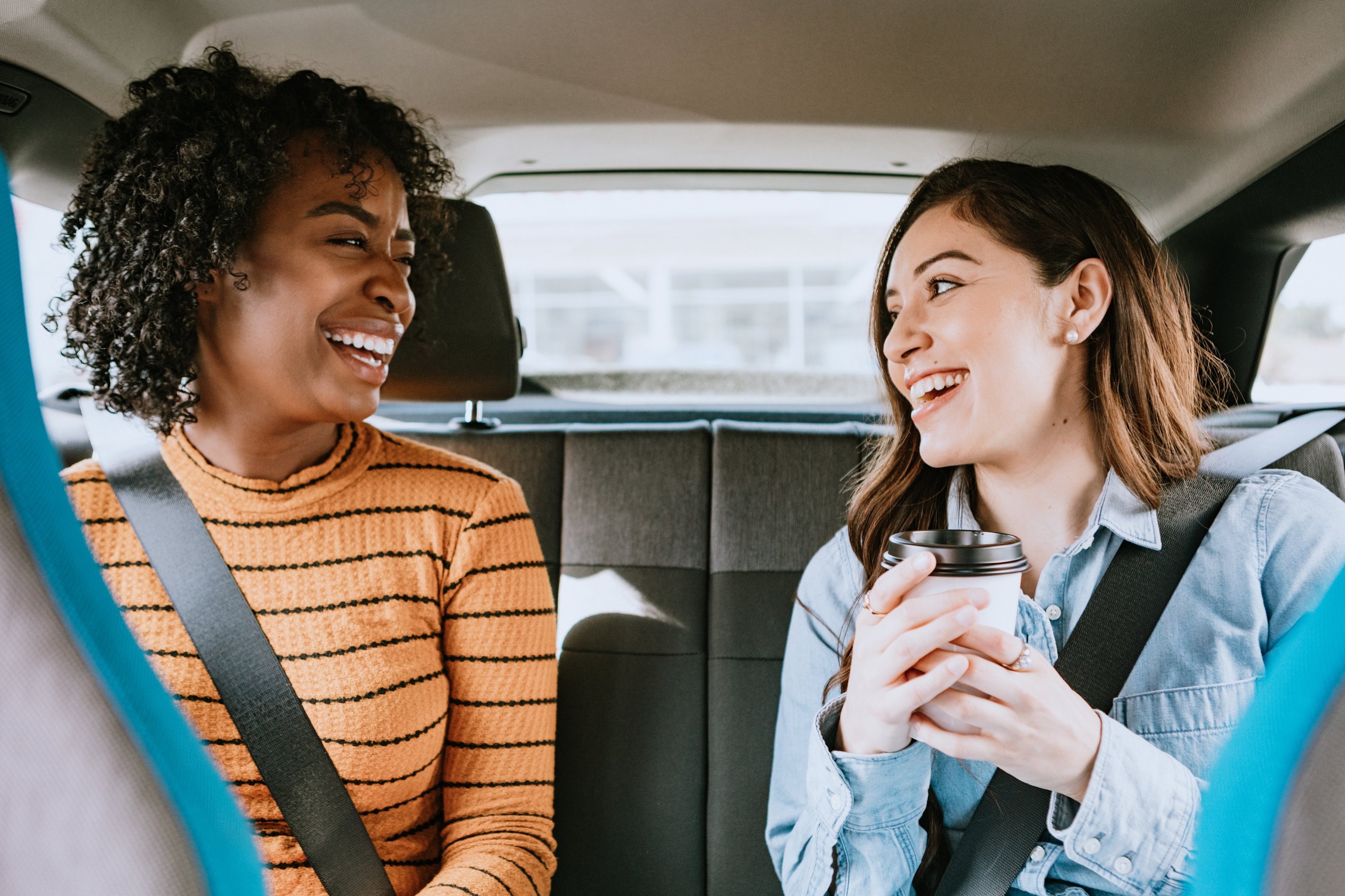 Two friends share a ride.