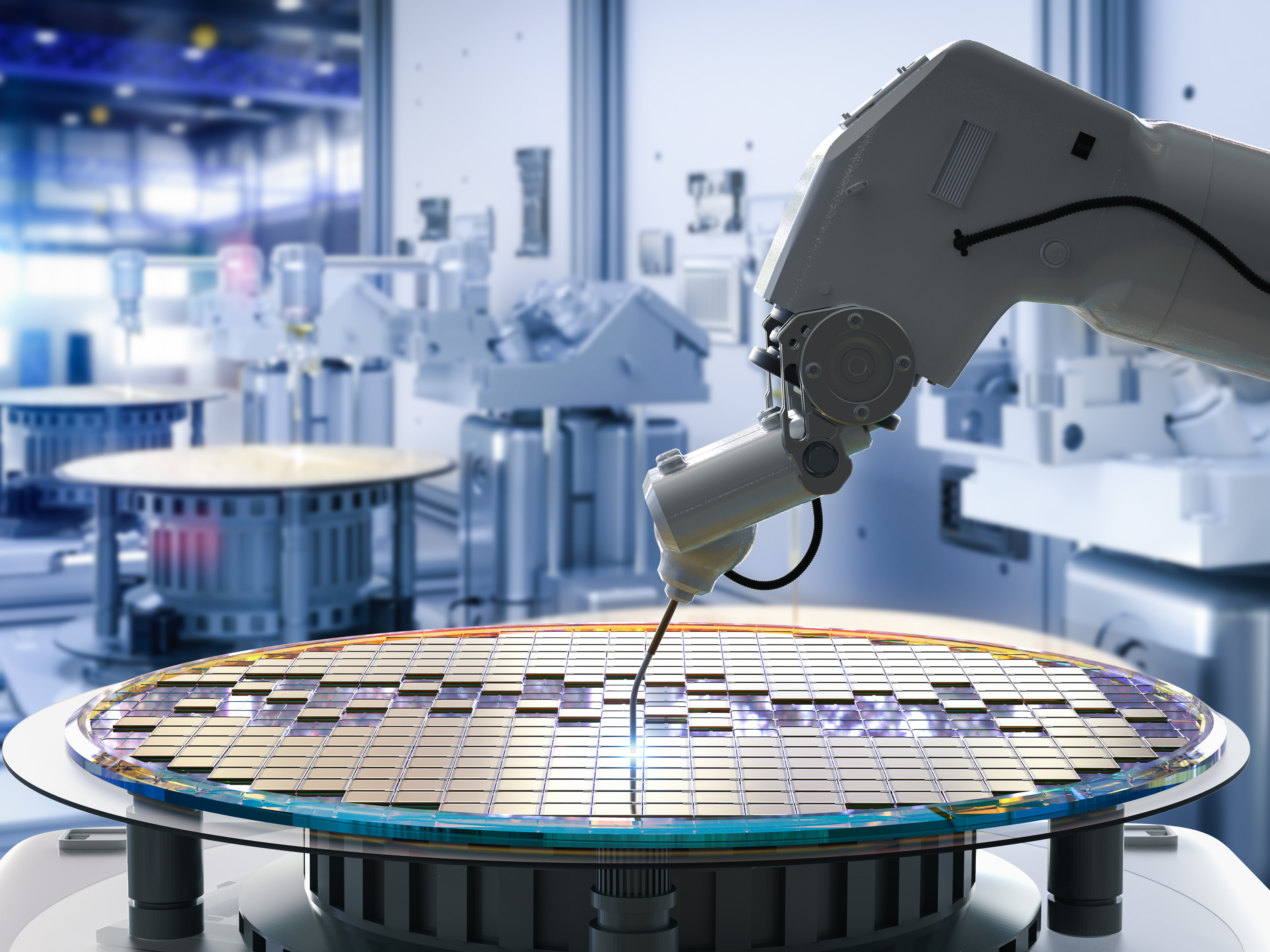 A robotic arm building a wafer.