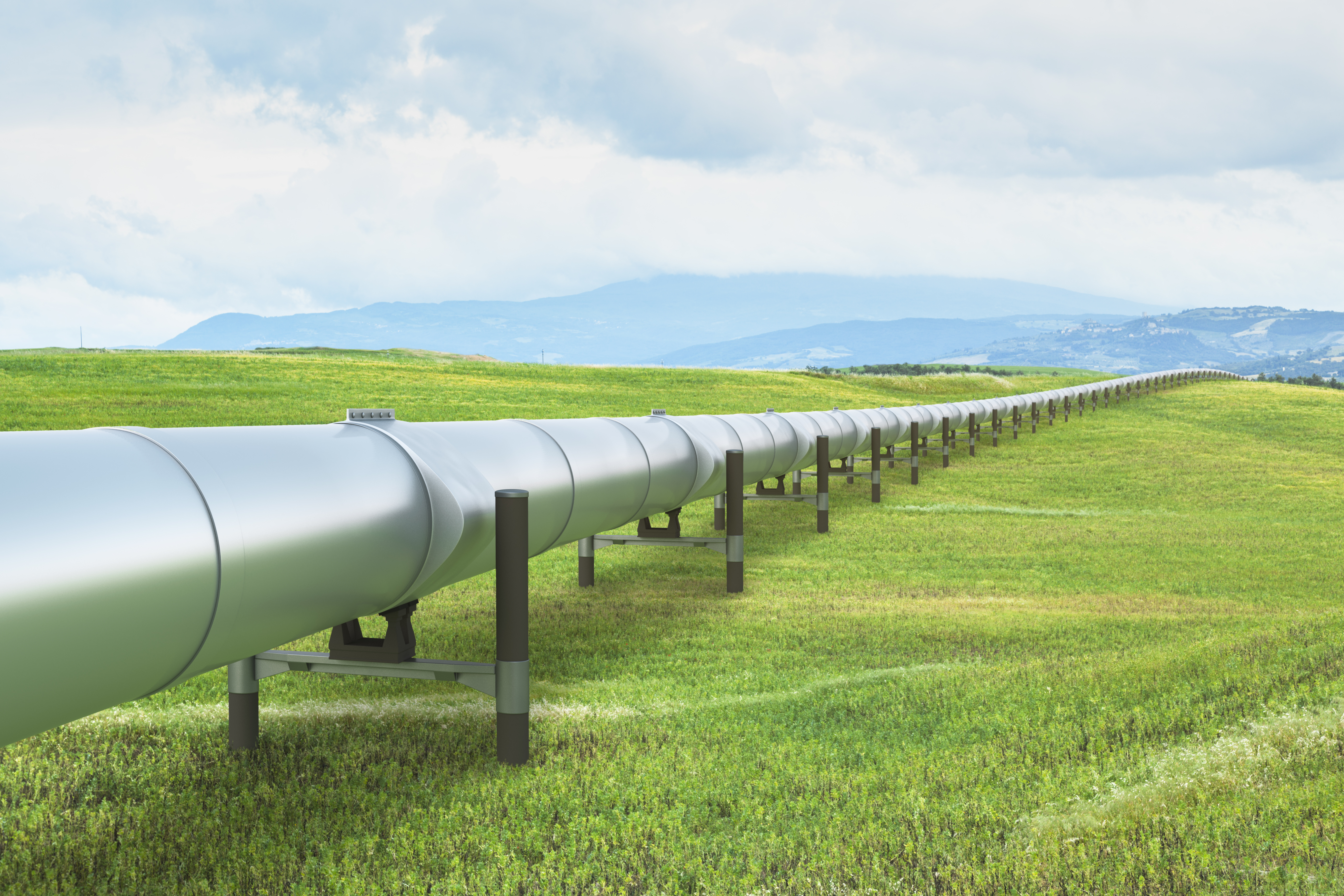 Large pipeline going through a field. 