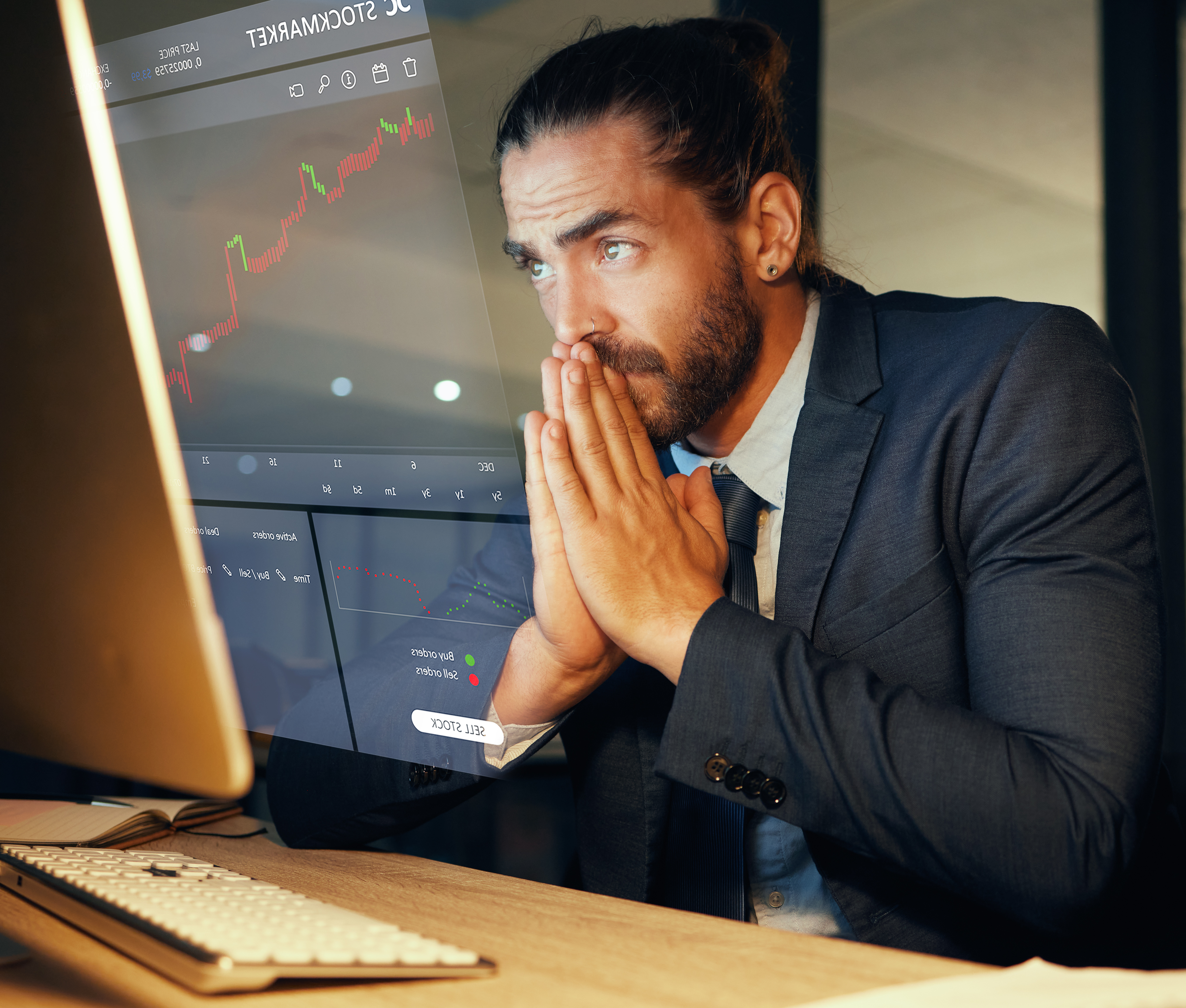 Nervous-looking person in front of a computer screen